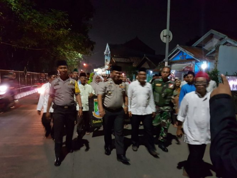 IMG-kapolsek-neglasari-bersama-lurah-mekarsari-kawal-kegiatan-pawai-taaruf-menyambut-bulan-suci-ramadhan