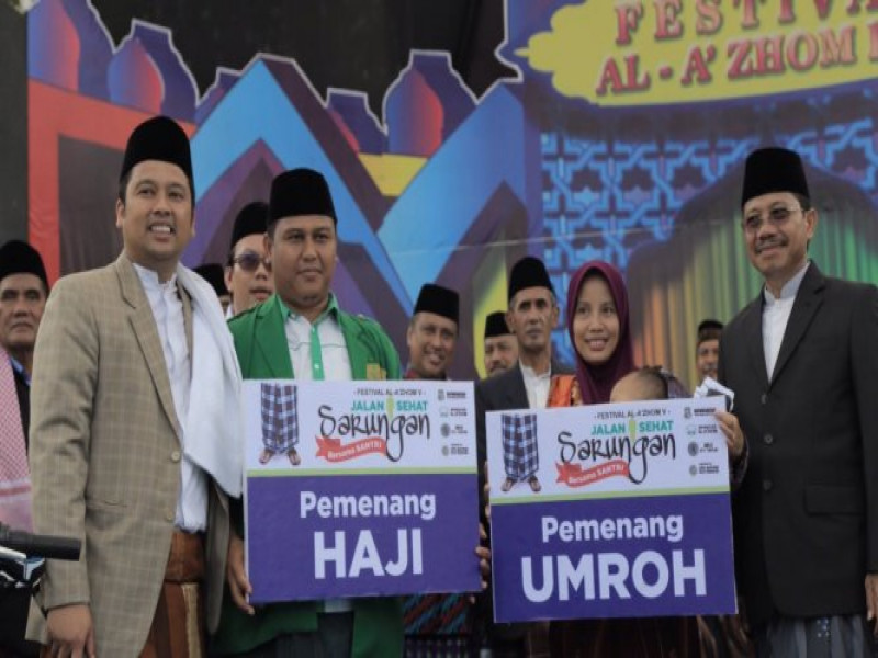 IMG-senangnya-pemenang-haji-dan-umroh-jalan-sehat-sarungan