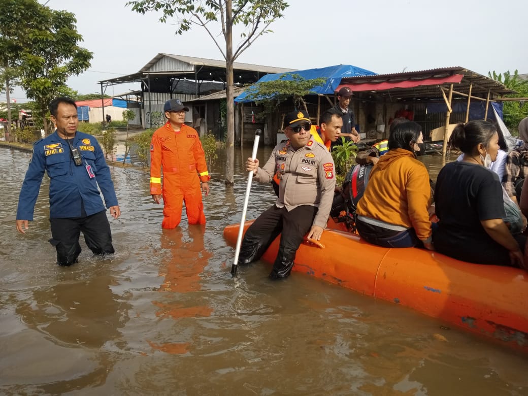 IMG-tersisa-delapan-titik-banjir-di-kota-tangerang-sejumlah-posko-telah-didirikan