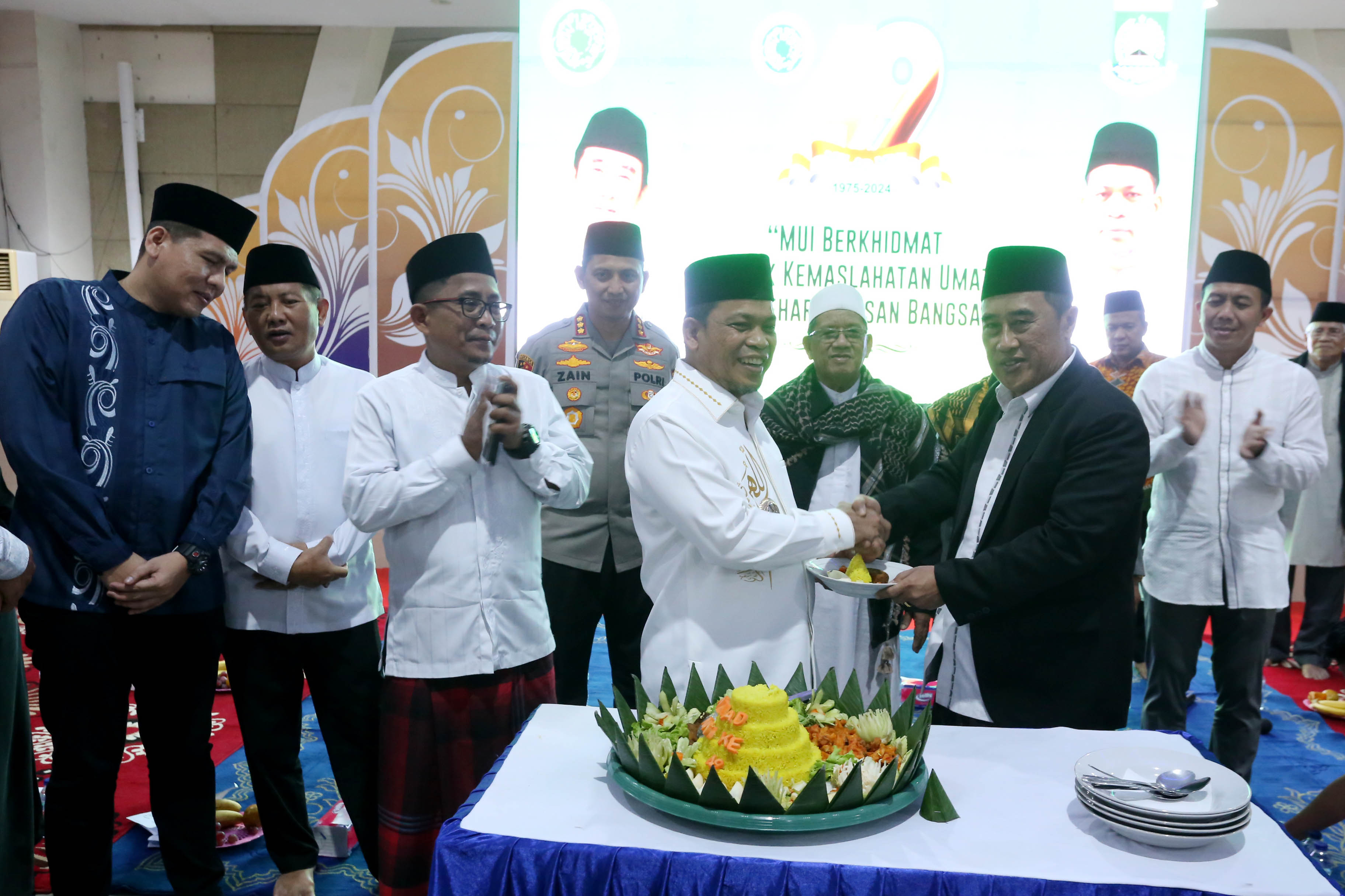 IMG-milad-mui-ke-49-pj-wali-kota-bersama-ulama-luncurkan-aplikasi-siar-mui